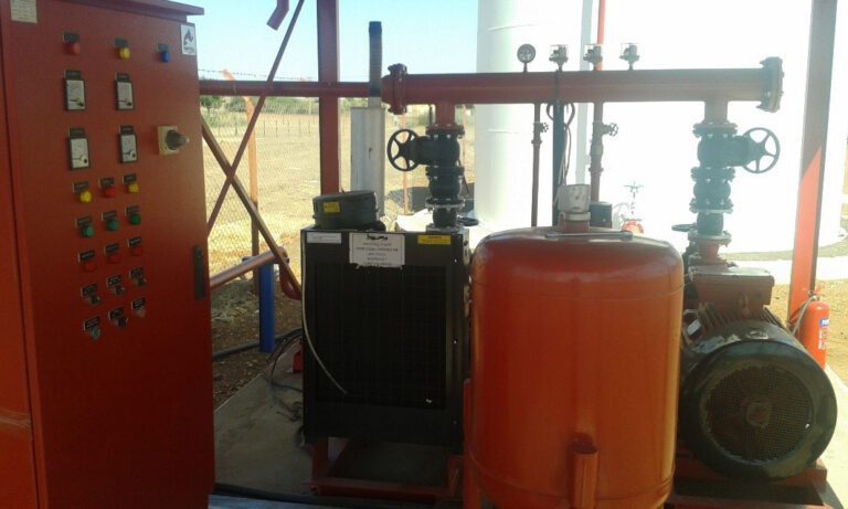 A central electrical control and distribution panel in the facility, visible next to the fire pump and pressure tank, is equipped with operating switches and performance indicators to monitor vital systems and ensure rapid response.