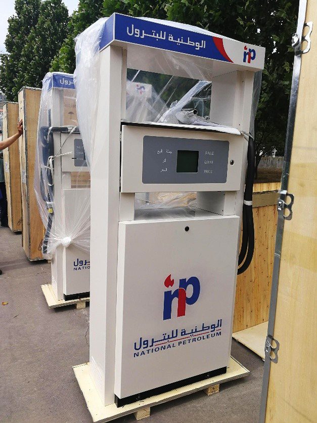 A modern digital fuel filling unit (Fuel Dispenser) appears at the supply stage, equipped with electronic screens to measure liters and price, and designed according to the highest standards of accuracy and safety for service in the company’s distribution stations.