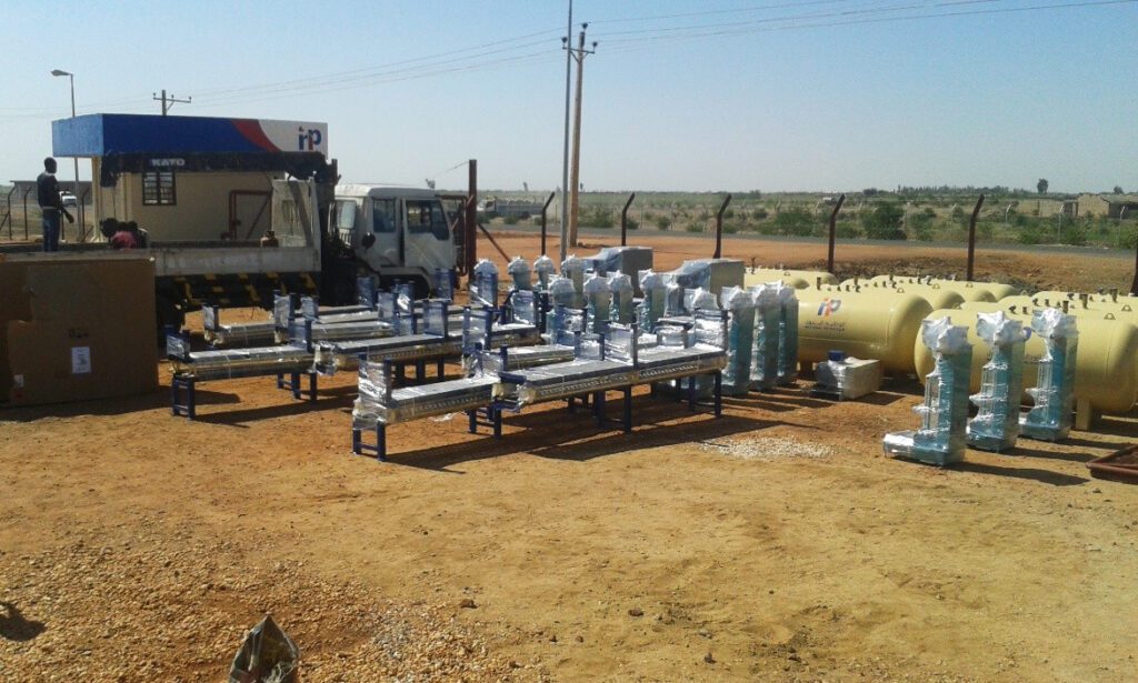 An engineering yard featuring a group of small gas tanks and modern metal filling platforms in the pre-assembly stage, reflecting the scale of the company’s expansion projects and advanced infrastructure.